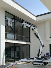 Remote controlled mini window mounting crane